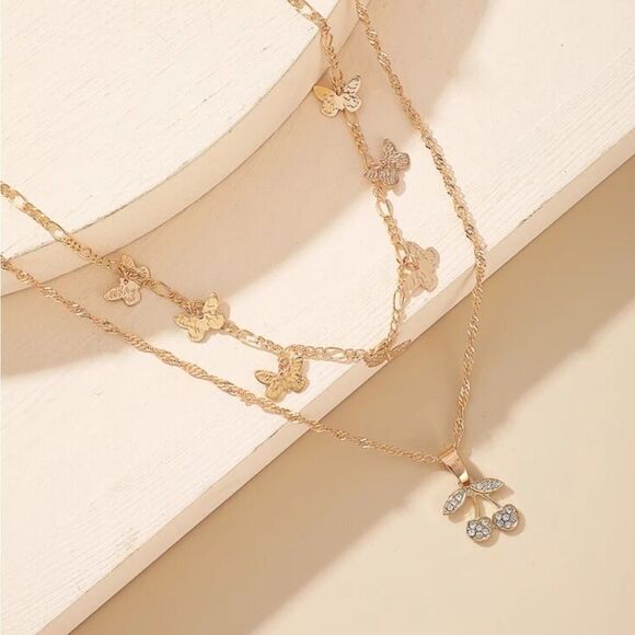 NEW! Layered Gold Butterfly & Cherry Charm Necklace - Picture 3 of 6